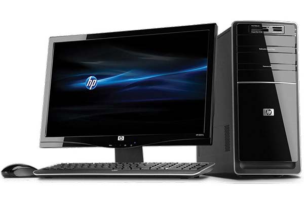 Photographie d'un ordinateur de bureau comprenant une tour, un écran, un clavier et une souris.